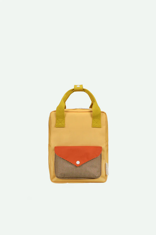 backpack small | envelope | apple juice